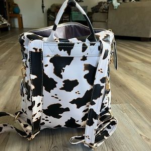 Cow print backpack purse
